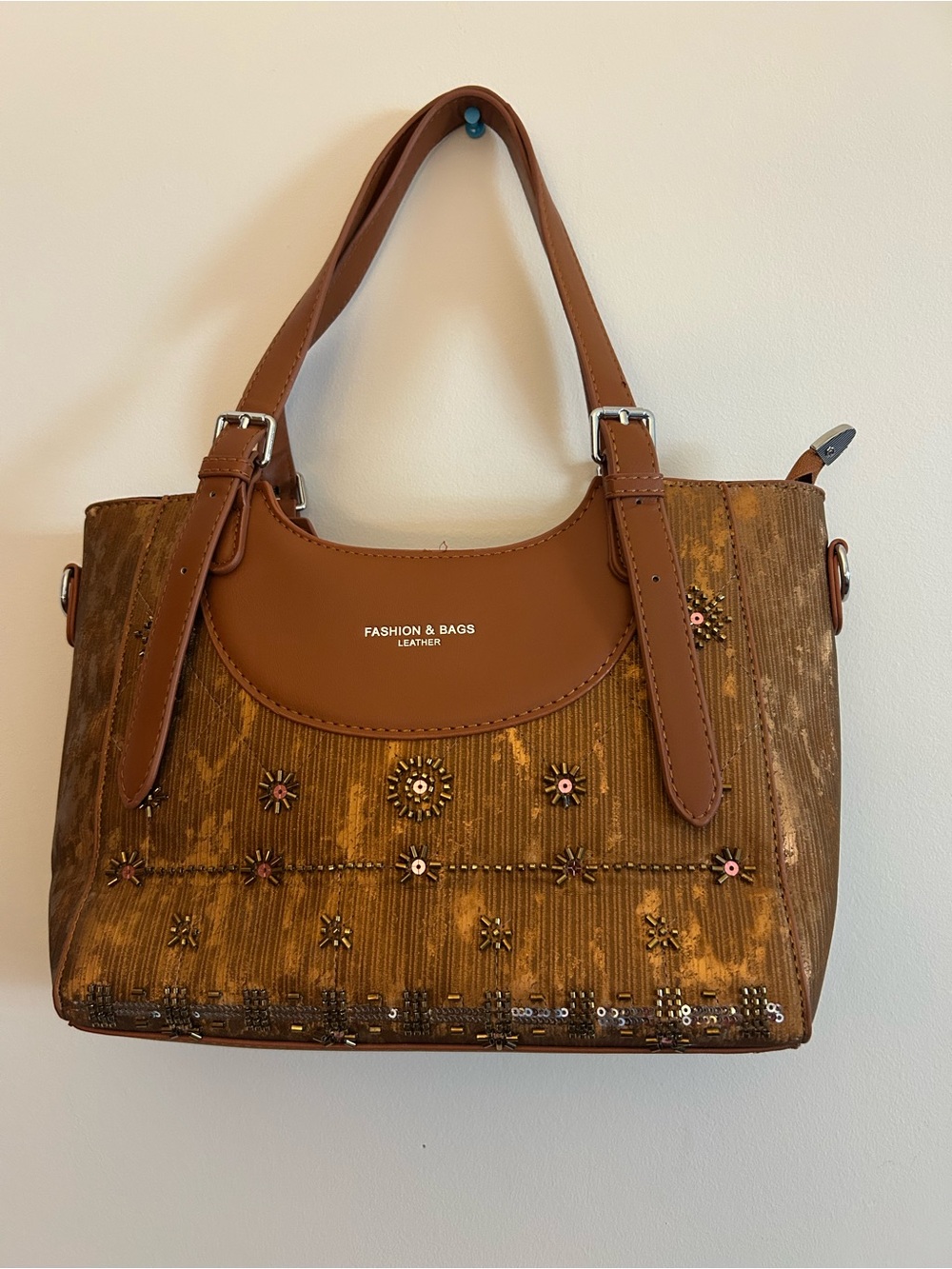 Embellished Brown Shoulder Bag with Floral Stud Accents